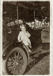 My grandmother Lorene Dodd on the fender of her father's car in 1917. Athens, Alabama.
(ShorpyBlog, Member Gallery)